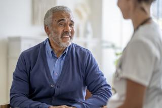 Patient consulting with medical staff about cancer prevention