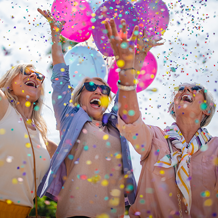 Seniors celebrating with balloons